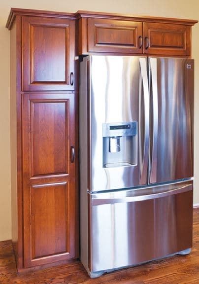 custom built refridgerator surround by jewel cabinet refacing